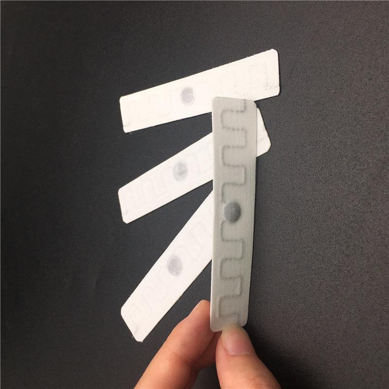 1617673969415750.jpg RFID服裝柔性洗滌標簽.jpg